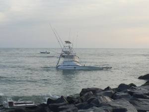 magic, boat crash at indian river inlet, boat us, fuel leak in ocean, north shore break,