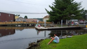 Kids fishing the park with their parents