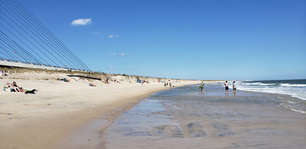 Indian River Inlet, north side beach, surfing beach, charles w cullen bridge, inlet bridge, coast guard station tower base, beach erosion, sand relocation pipe,