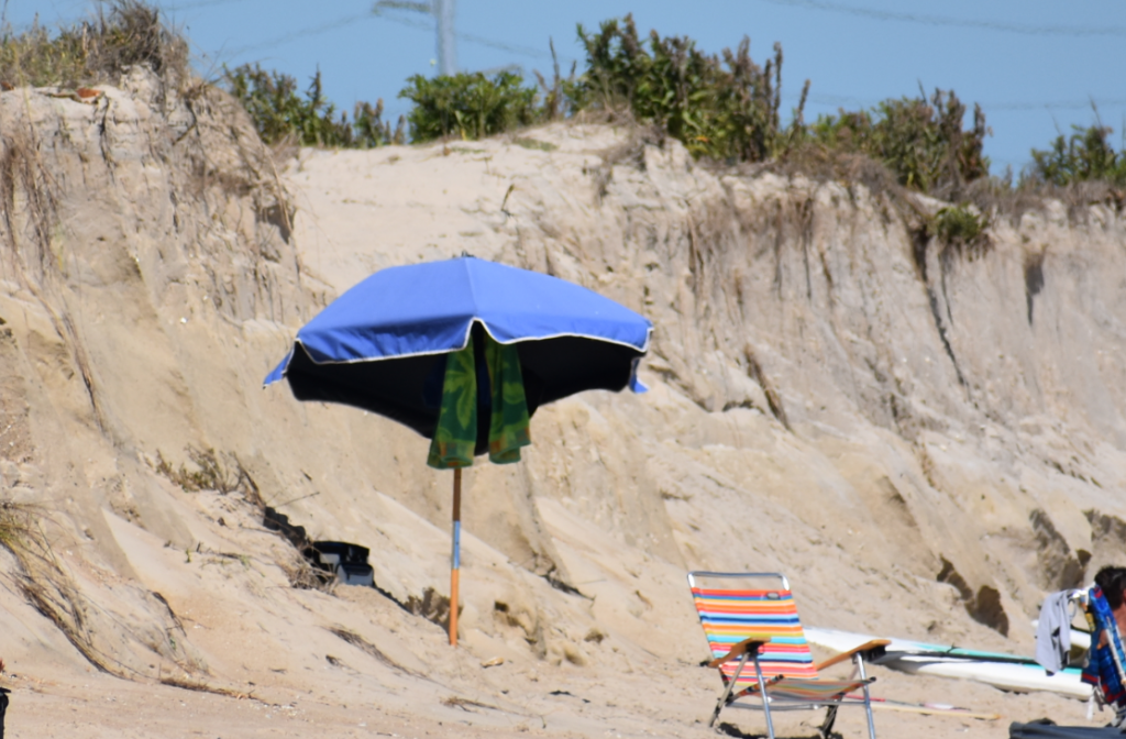 Indian River Inlet, north side beach, surfing beach, charles w cullen bridge, inlet bridge, coast guard station tower base, beach erosion, sand relocation pipe,